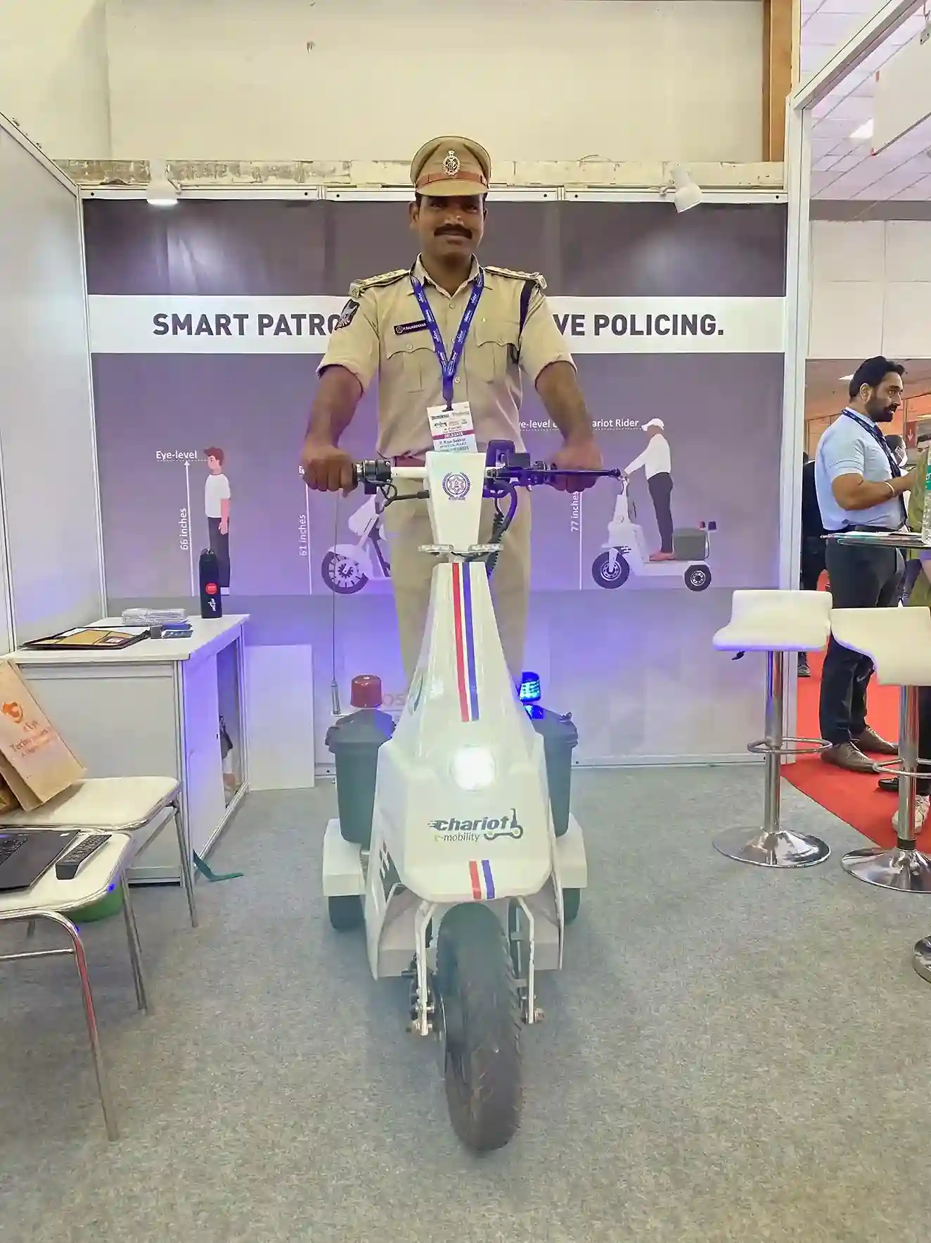 a policeman rides Chariot